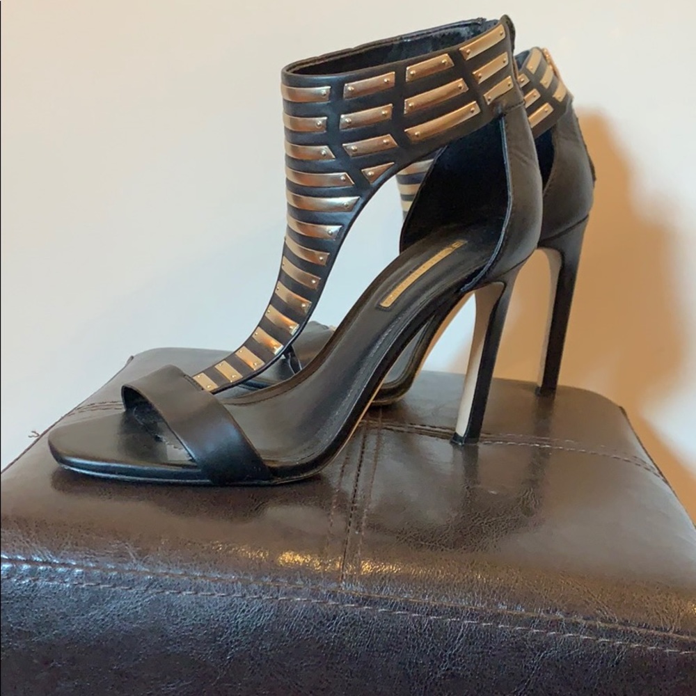 Black BCBG heels with gold/silver embellishment